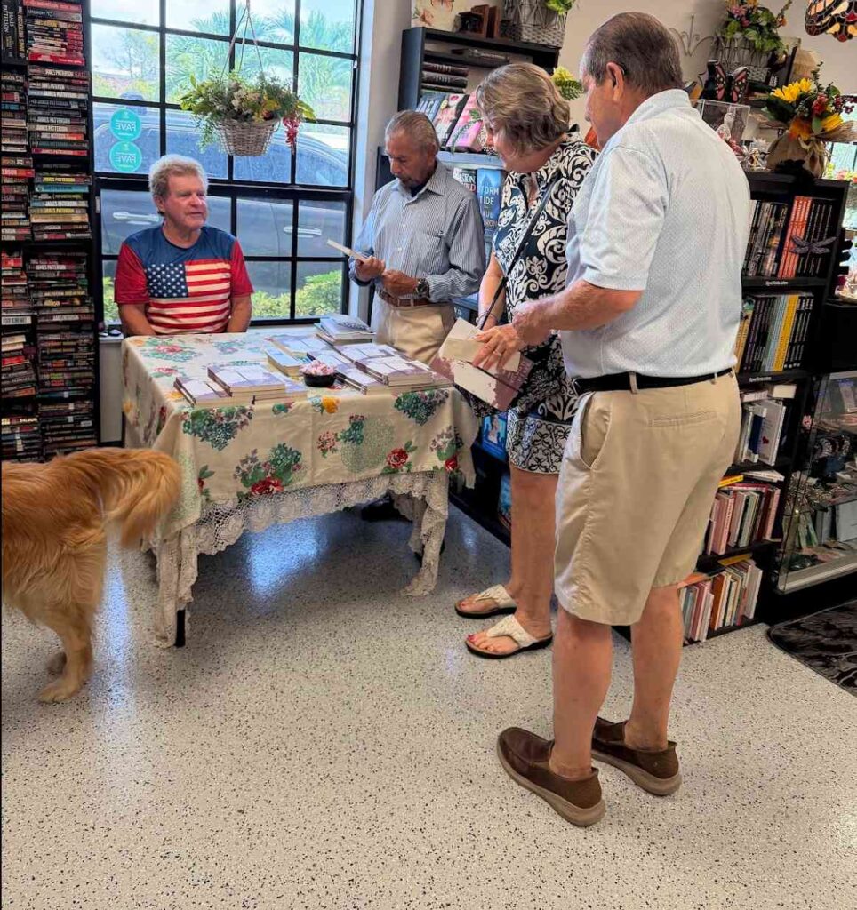 author tommie weber at book signing event for novel Chasing Miracles